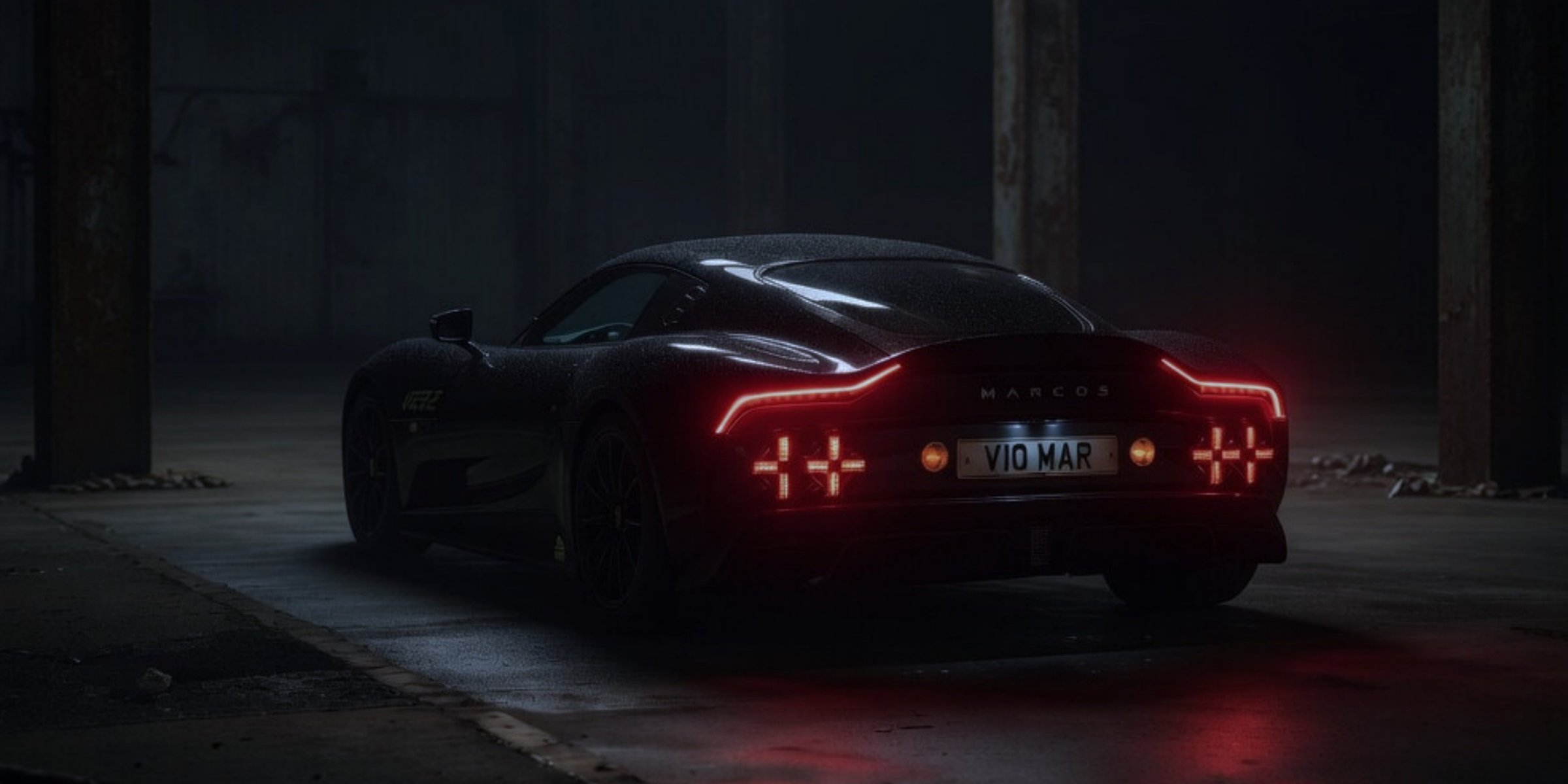 The Marcos Manticore supercar, photographed three-quarter rear in a dim studio